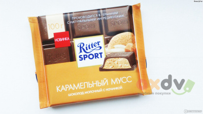 Фото Риттер спорт Карамельная нач. и кусочки сол.миндаля мол.шок 100г/11шт в интернет-магазине axdv.ru