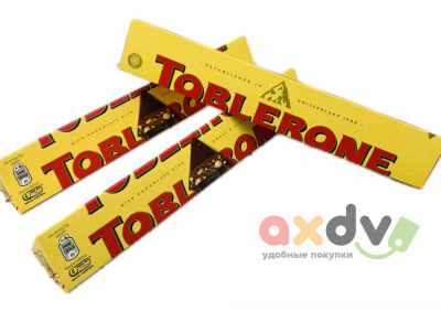 Фото Шоколад молочный Тоблерон / Toblerone с медово-миндальной нугой 100гр*20шт (Импорт) в интернет-магазине axdv.ru