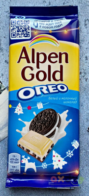 Фото Шоколад Альпен Гольд / Alpen Gold "С белым шоколадом с начинкой со вкусом ванили и кусочками печенья Орео в интернет-магазине axdv.ru